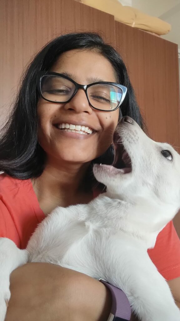 Riya with her dog Vanilla.